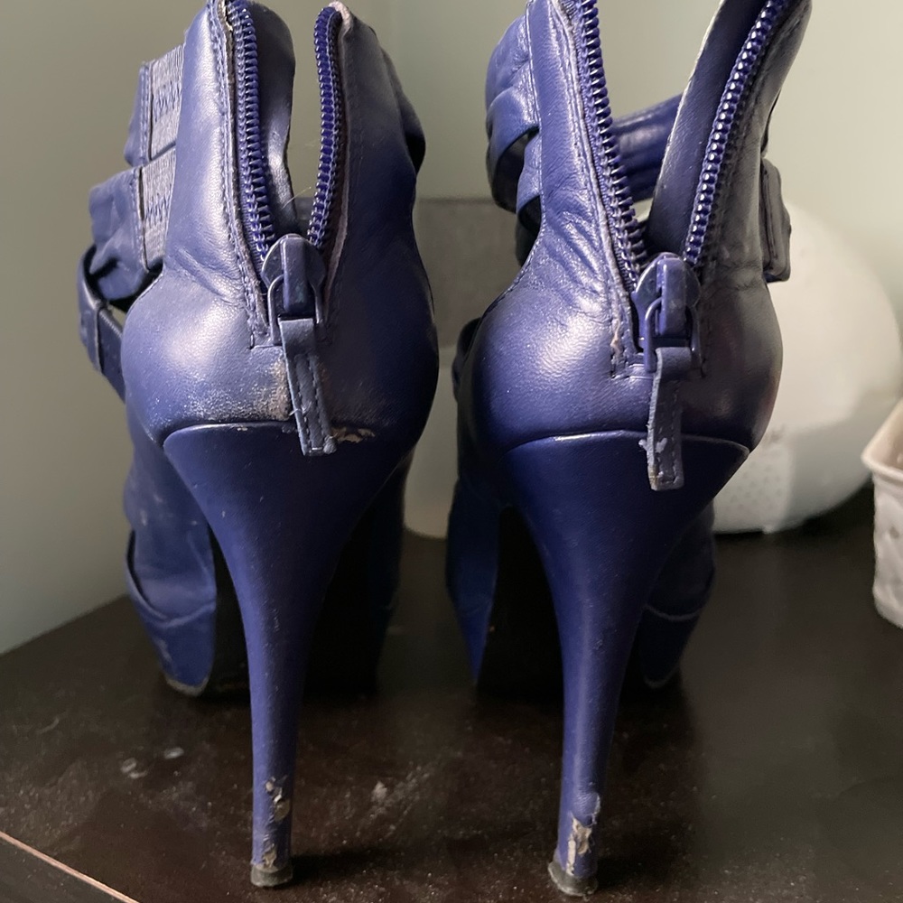 Platform style with back zipper. Worn only once or twice for special events